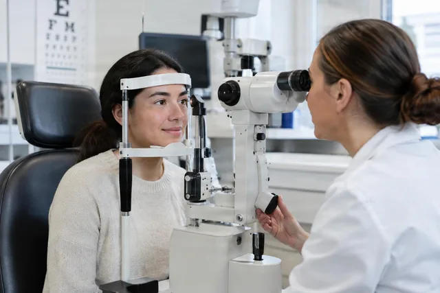 Patient at Eye Exam Slit Lamp