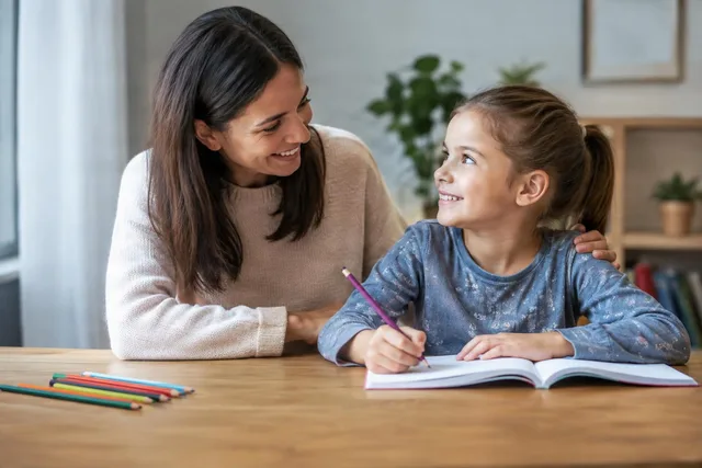 Mother Encouraging Child Studying