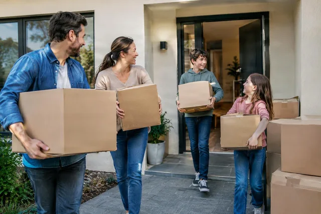 Family Moving Into New Home