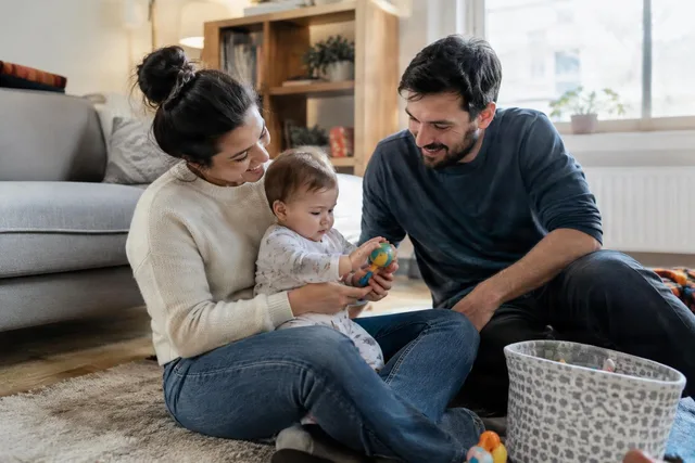 Parents Playing With Baby