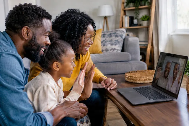 Family Waving on Video Call