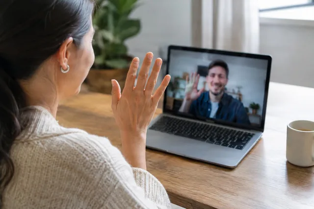 Waving During Laptop Video Call