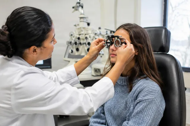 Optometrist Fitting Trial Frame