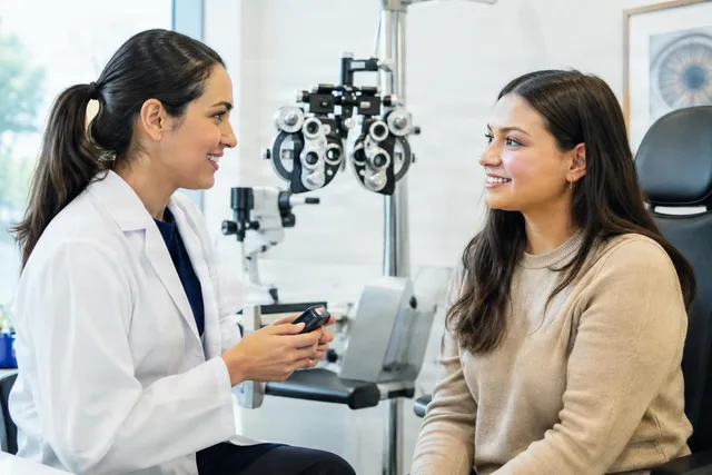 Optometrist Consultation With Patient