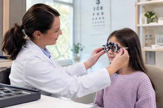Optometrist Fitting Trial Frame
