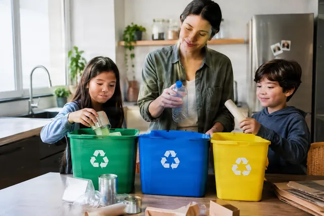 Family Sorting Recycling at Home
