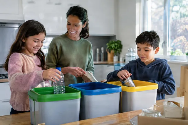 Family Sorting Recycling at Home