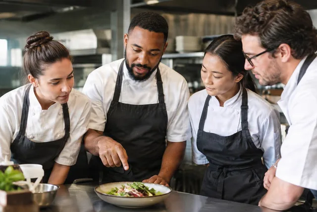 Chef Team Reviewing Plated Dish