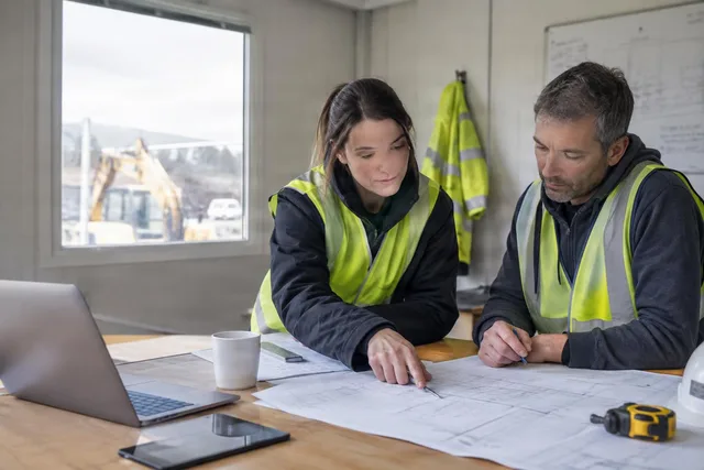 Site Team Reviewing Blueprints