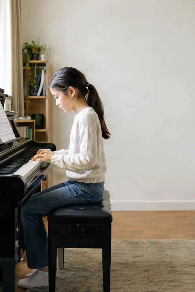 Child Practicing Piano at Home