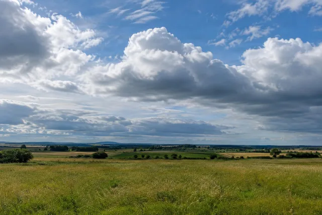 Cumulus Clouds Over Open Fields