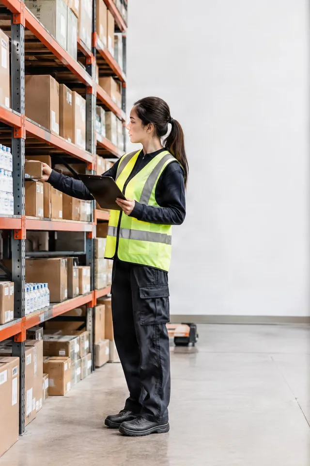Warehouse Inventory Check With Clipboard