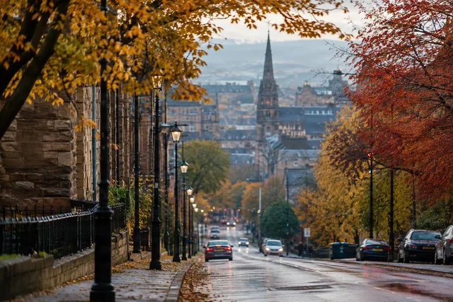 Autumn Street With Distant Spire