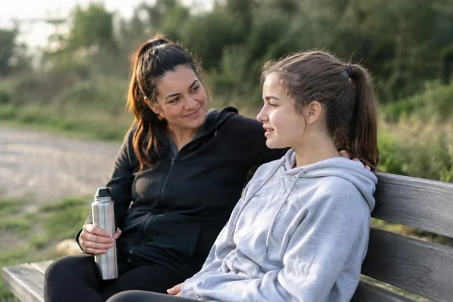 Supportive Talk on Park Bench